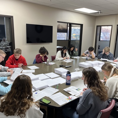 YIC members researching nonprofit organizations for the Spring grant program
