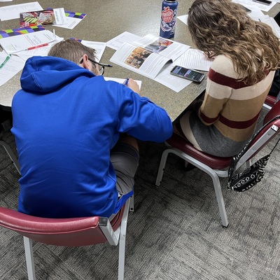 YIC members researching nonprofit organizations for the Spring grant program
